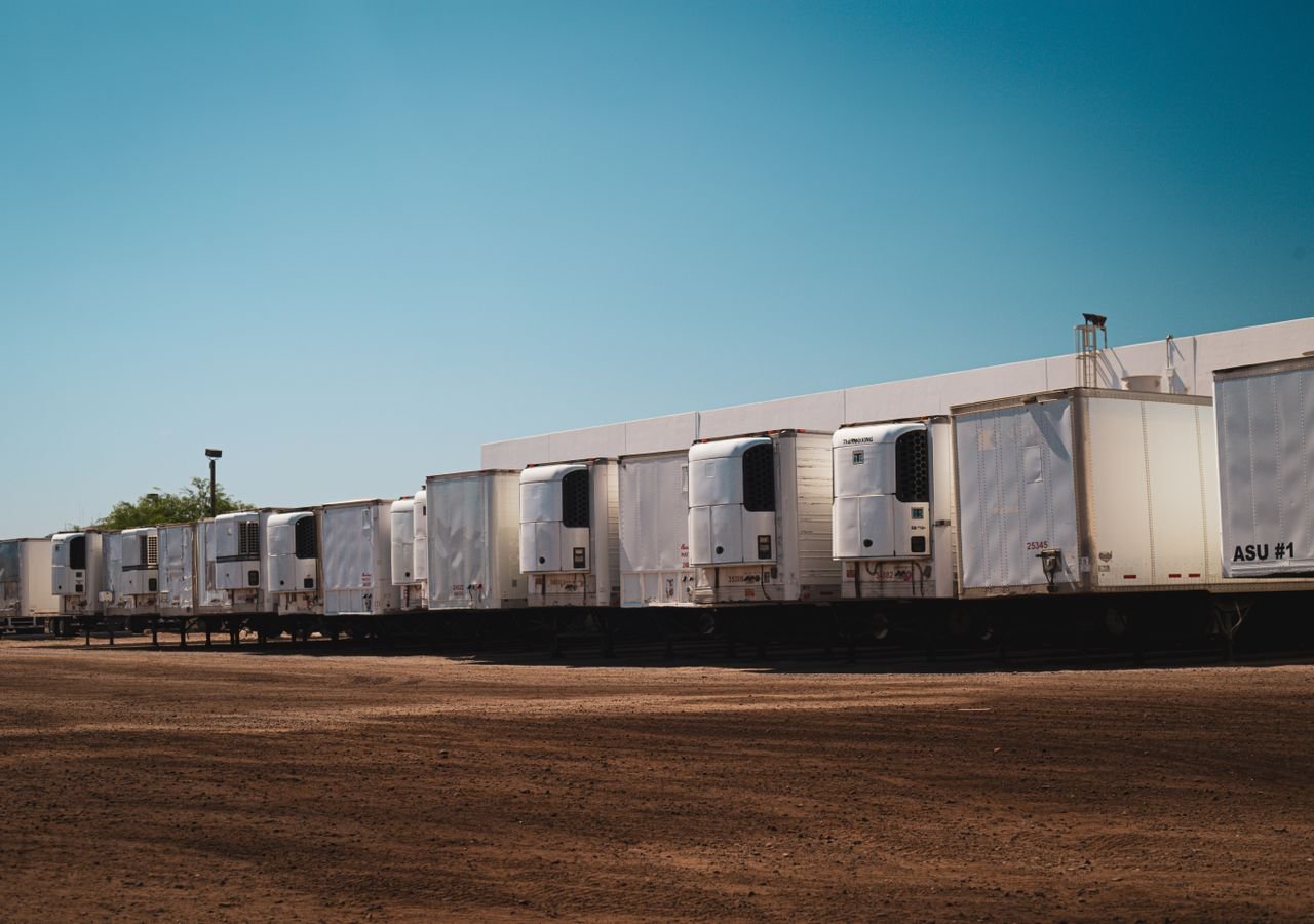 A lineup of 77 Trucking Company trucks
